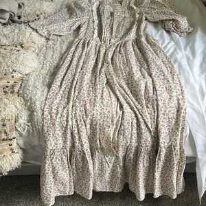 Doen dress only tried on. XS. Buttons up the front. Never worn.